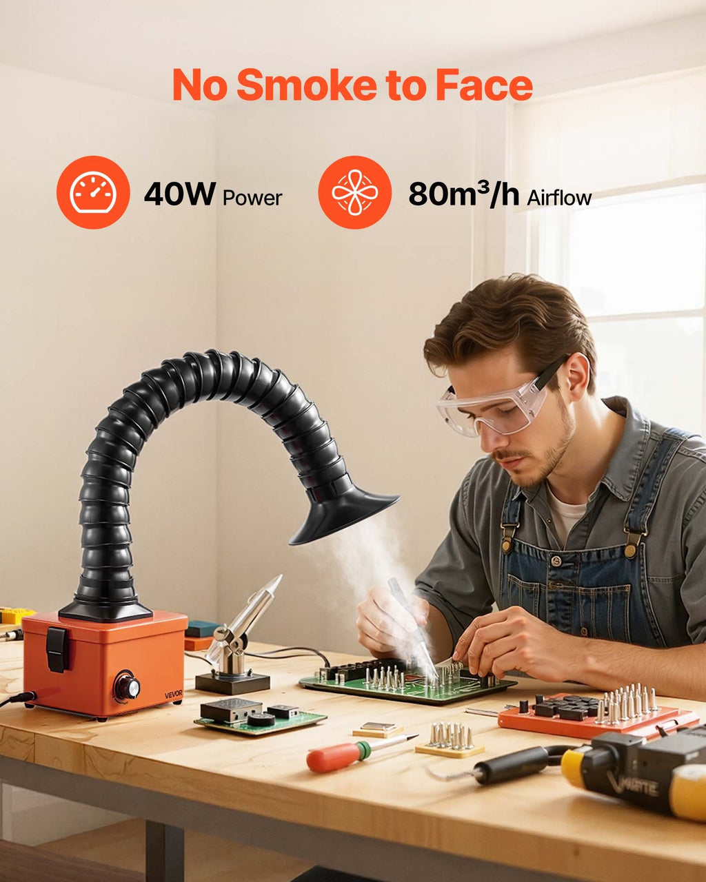 Fume extractor drawing solder smoke away from a technician at a workbench