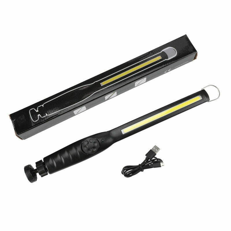 FlexBeam inspection light lying flat with its charging lead